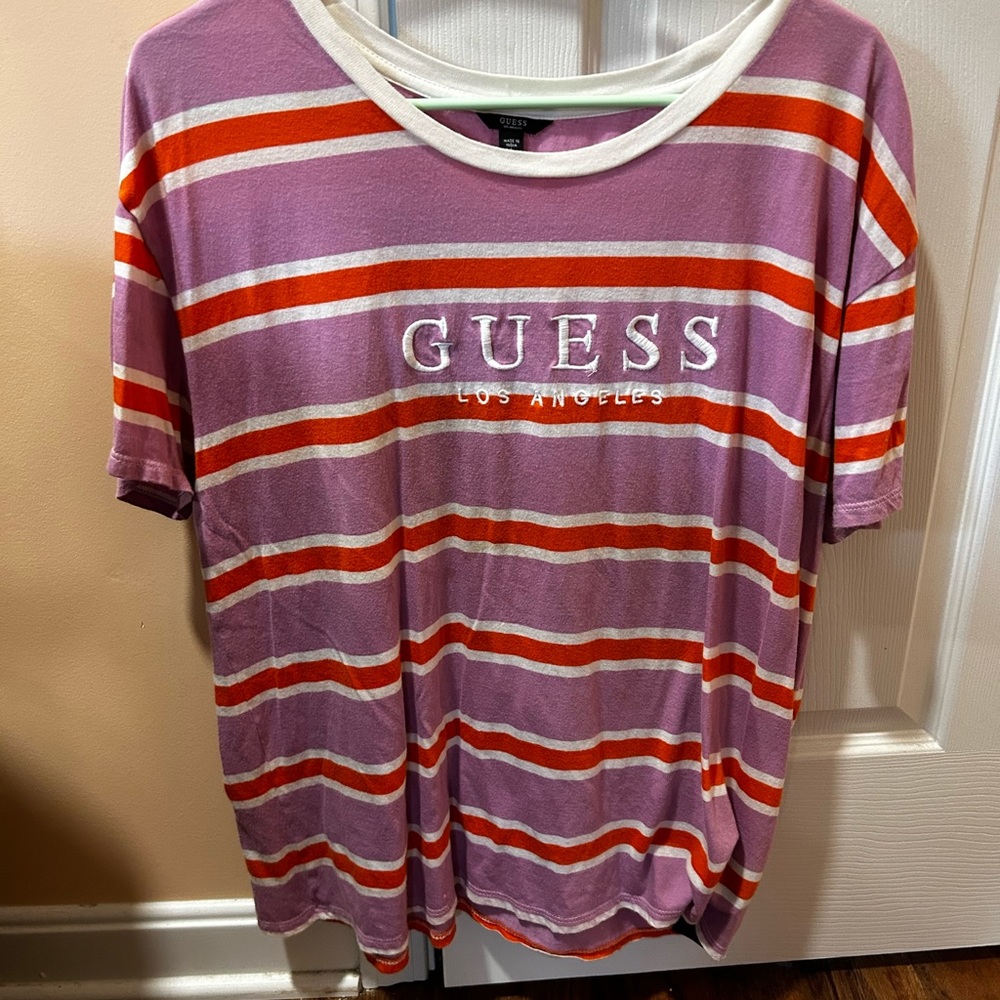 This is a Guess brand oversized short sleeved shirt in size large